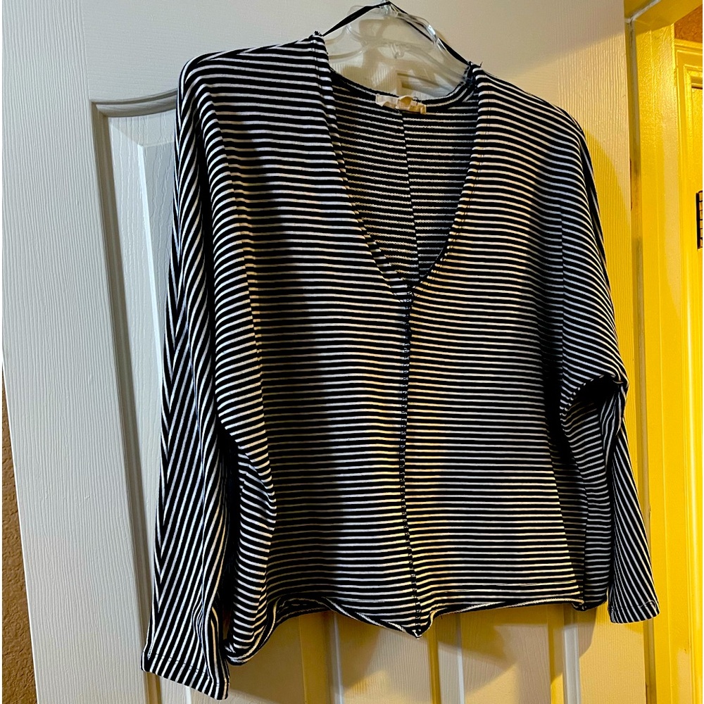 Neckline, sassy navy and white strips. Long sleeves. Sexy look! neck to tail 23”